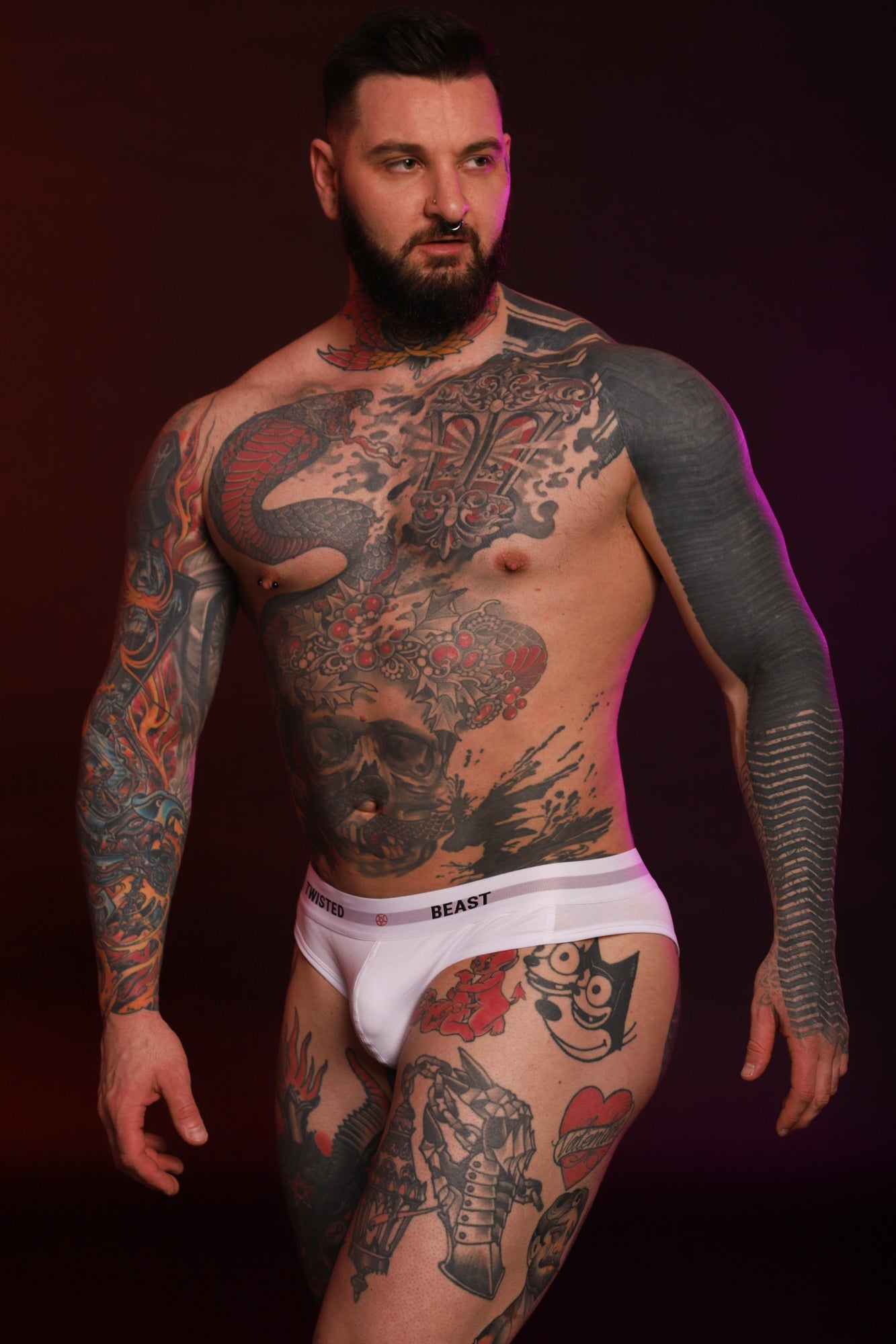A model wearing a Twisted Beast Insignia Brief in White.