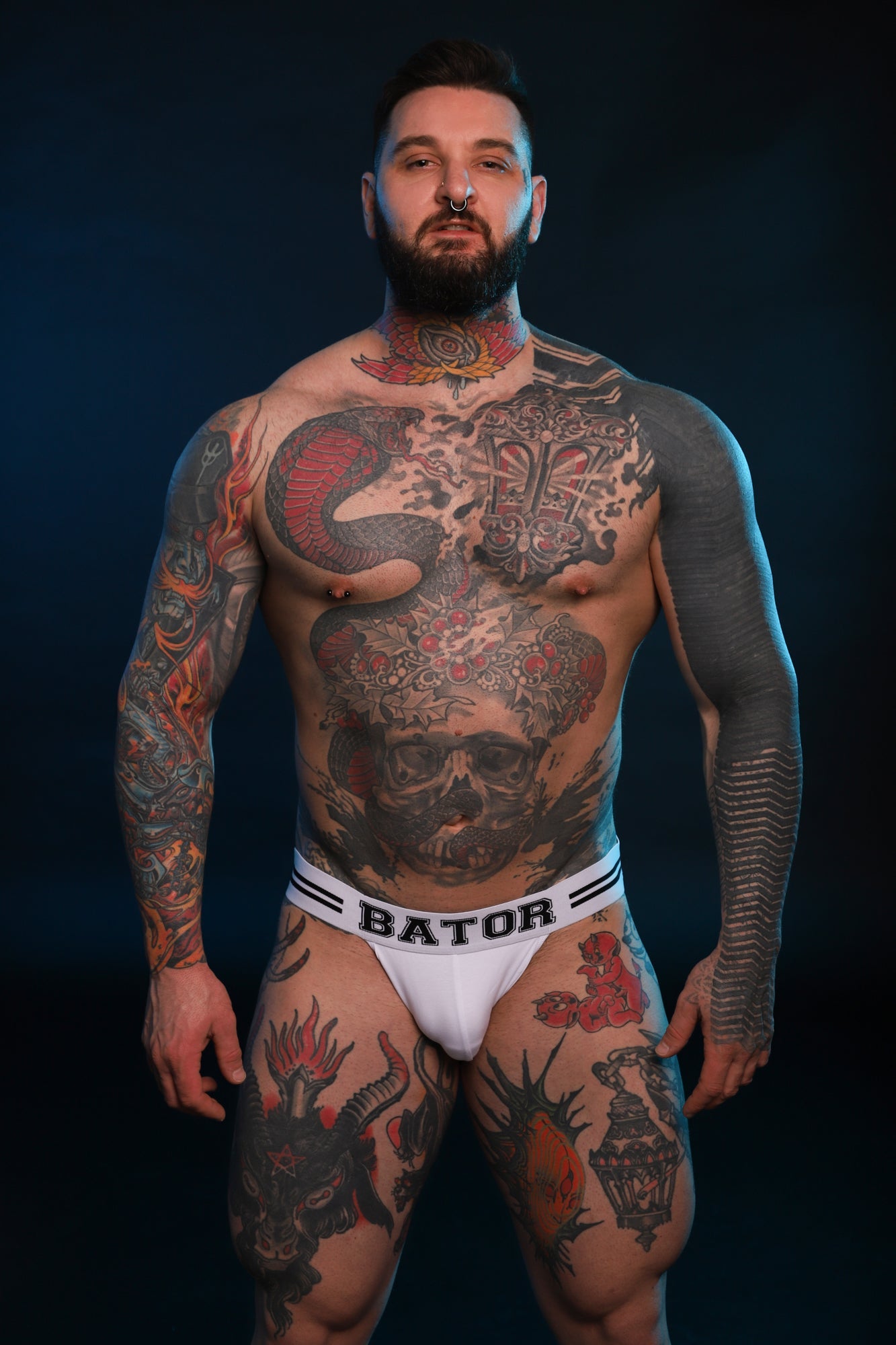 A Twisted Beast model showing the front of a white Bator Jock.