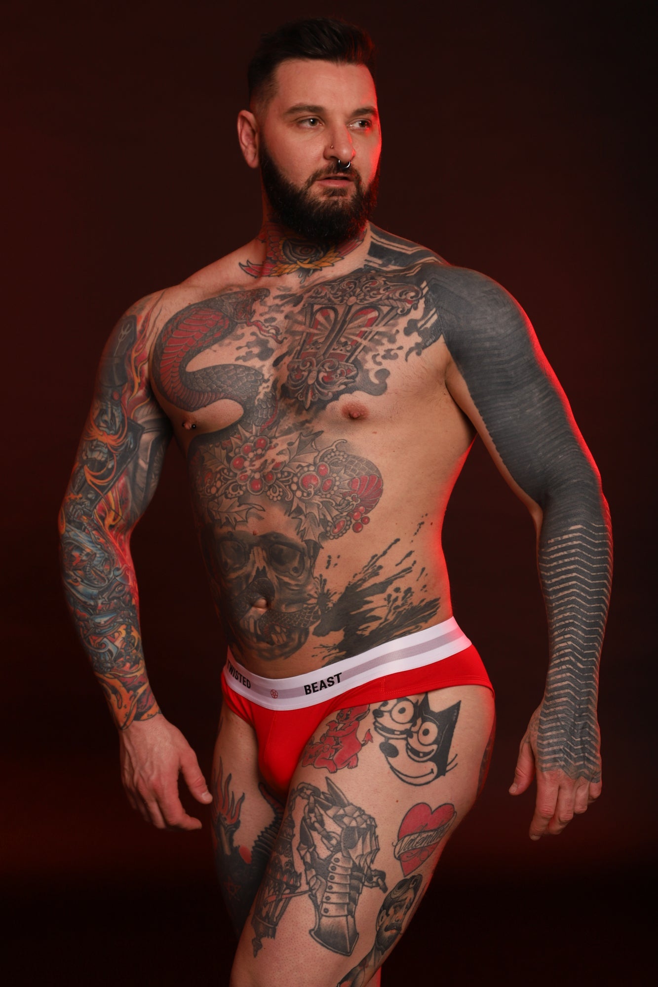 A model wearing a pair of red Insignia Briefs.
