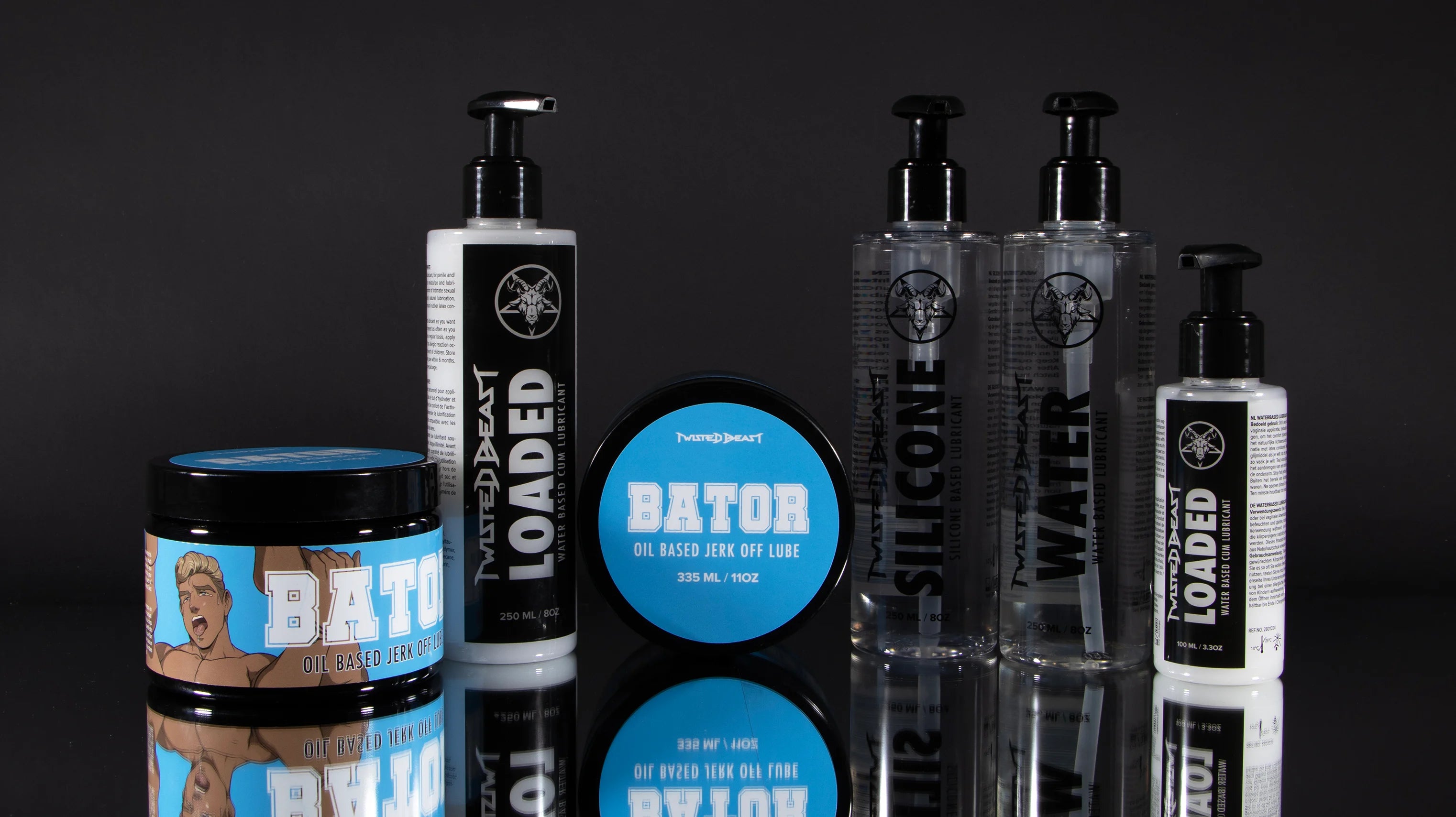 A promotional photo showing a line of Twisted Beast lube bottles.
