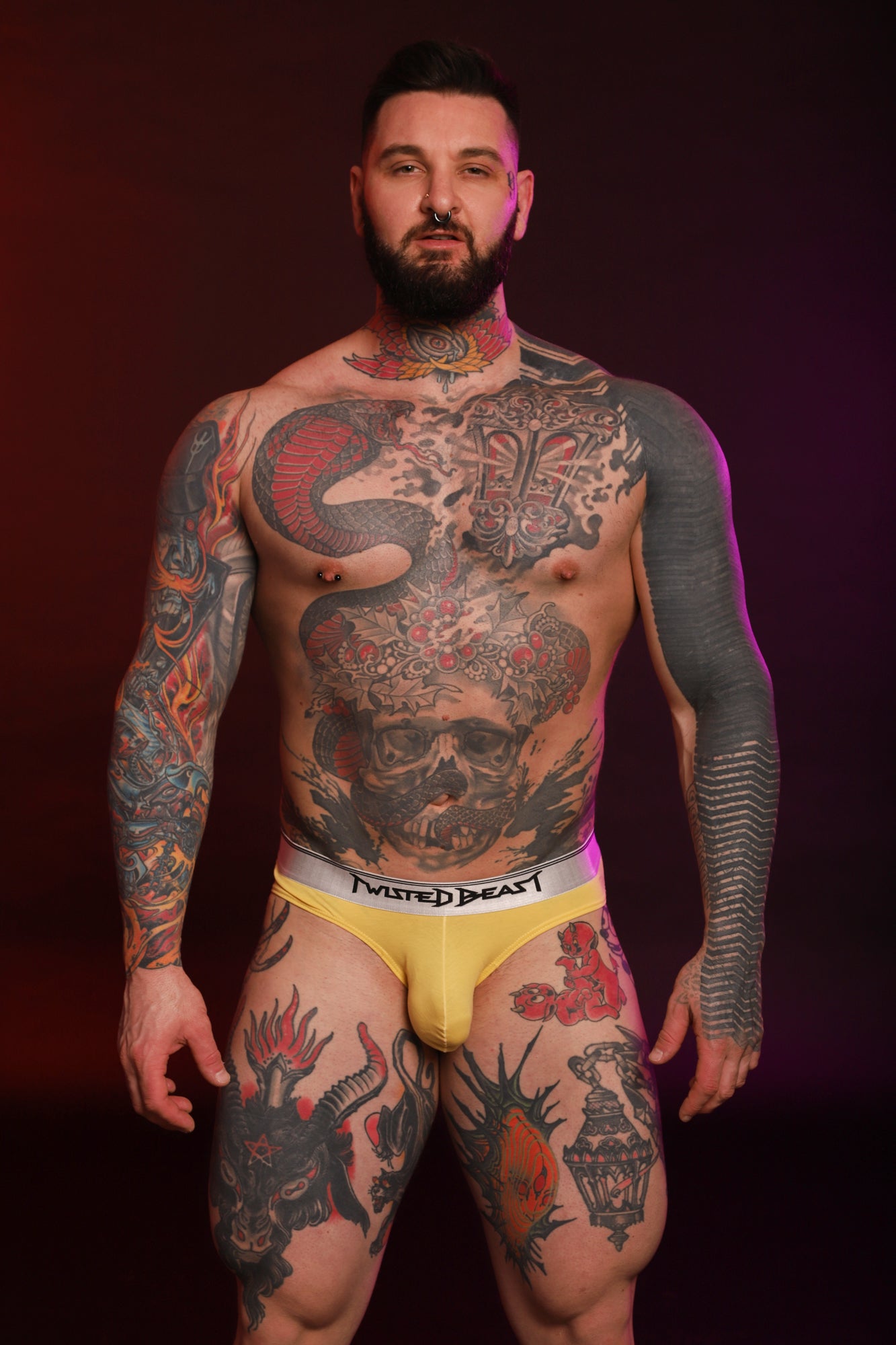 A frontal photo of a model wearing yellow Y2K Briefs.